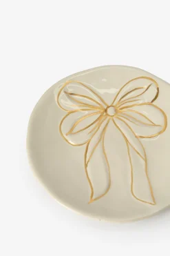 Beige dessertbord met gouden strik