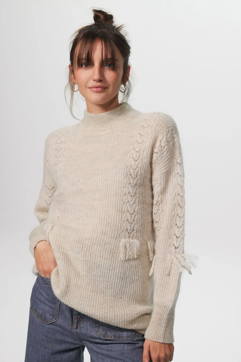 Beige gebreide tuniek met franjes
