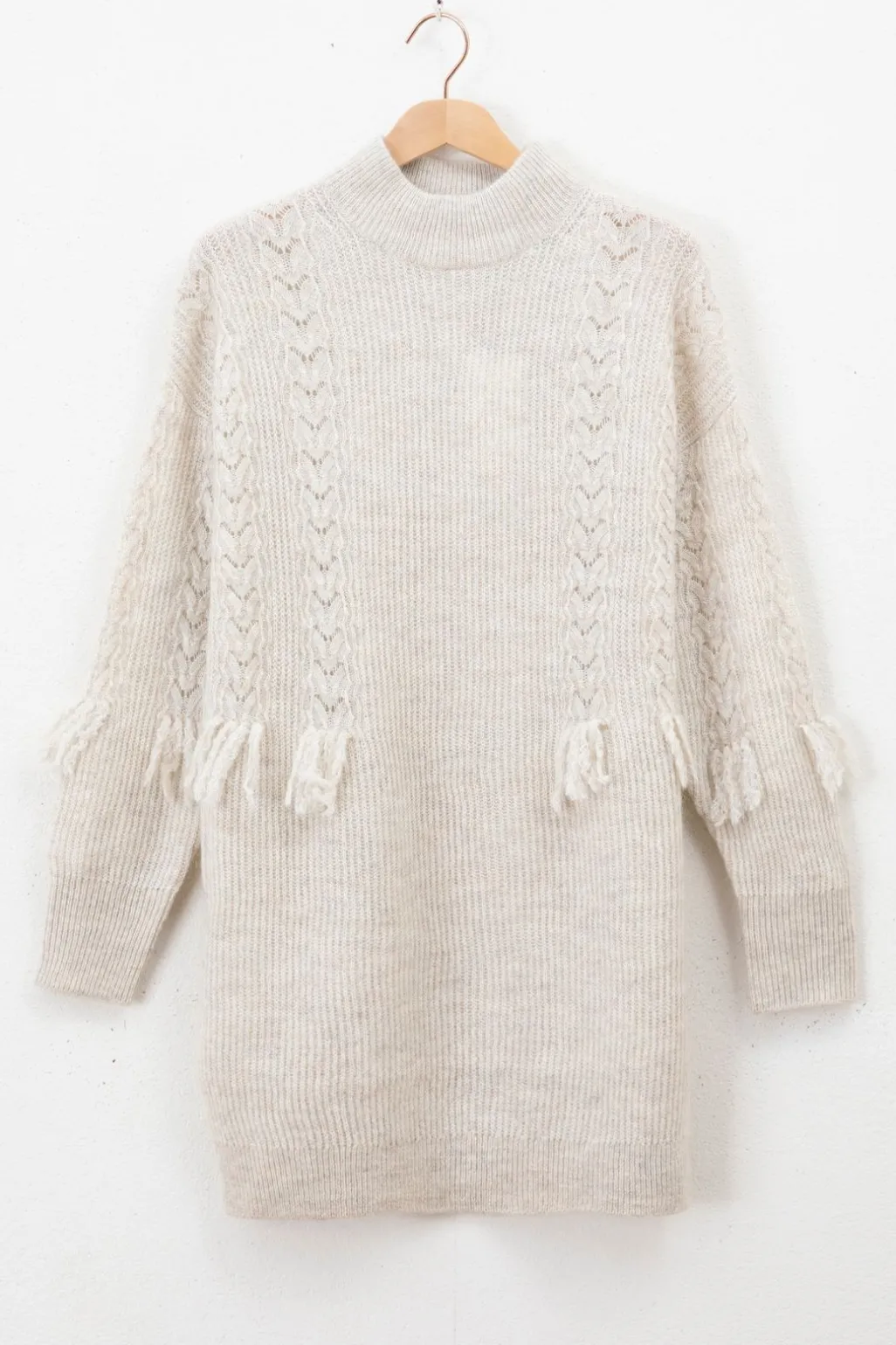Beige gebreide tuniek met franjes