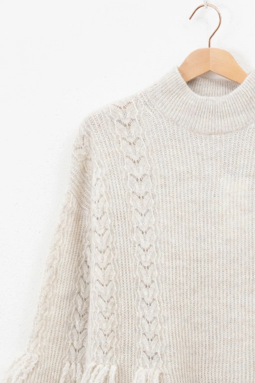 Beige gebreide tuniek met franjes