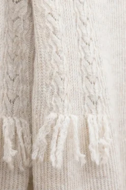 Beige gebreide tuniek met franjes