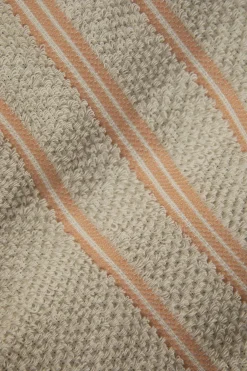 Beige gestreepte handdoek en theedoek terry