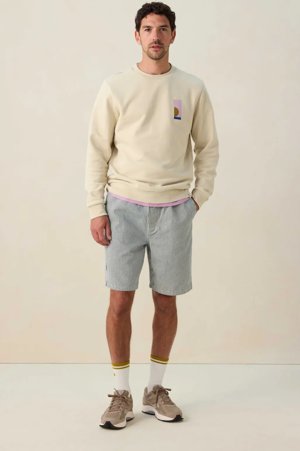 Beige sweater met grafische print