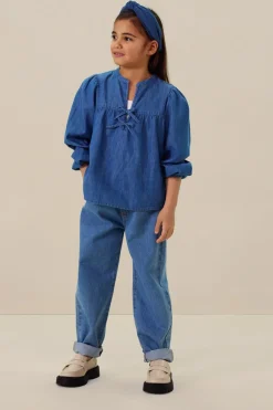 Blauwe denim blouse met strikjes