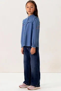 Blauwe denim ruffle blouse