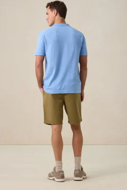 Blauwe gebreide polo