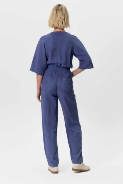 Blauwe jumpsuit met knopen
