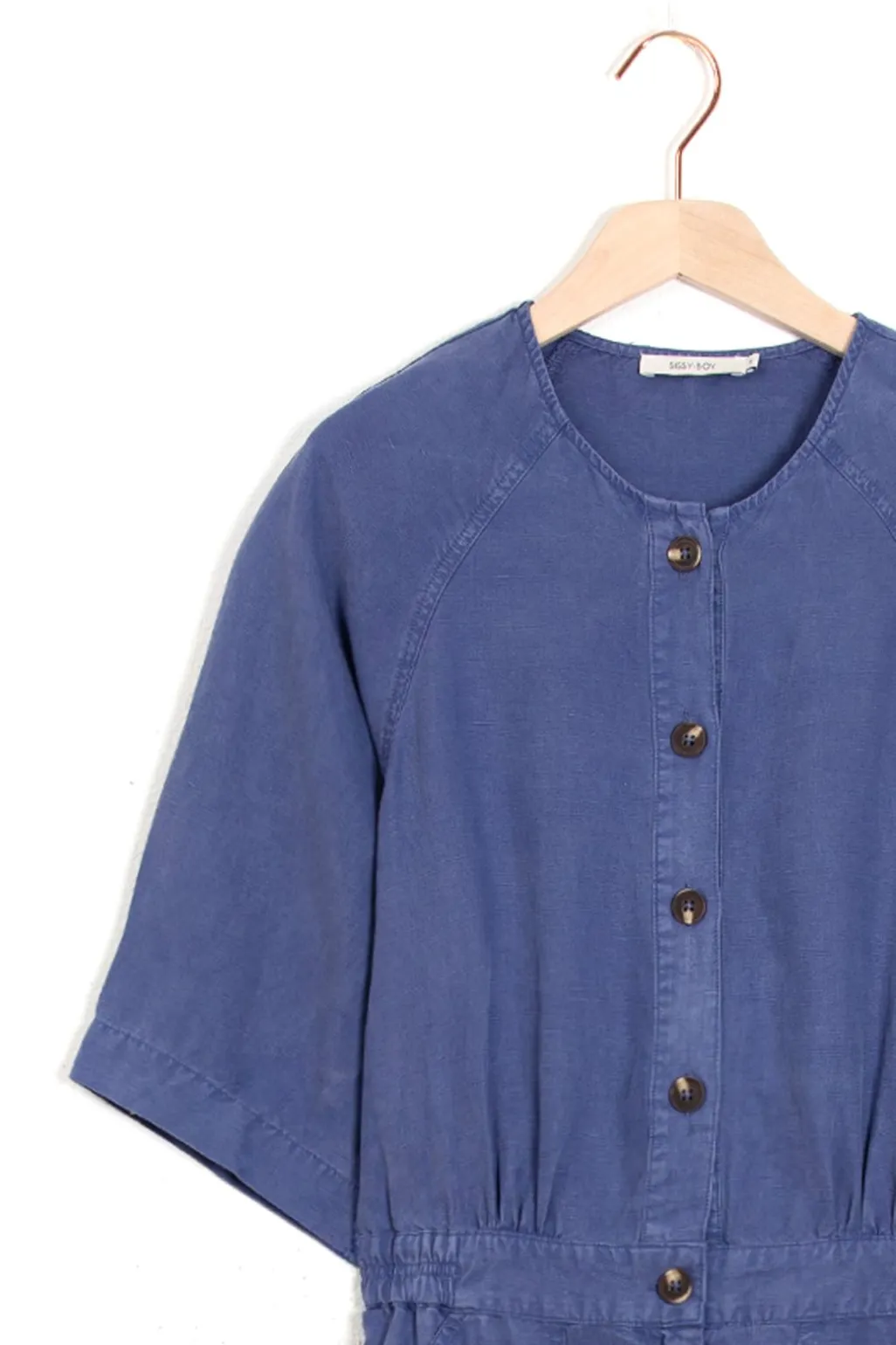 Blauwe jumpsuit met knopen