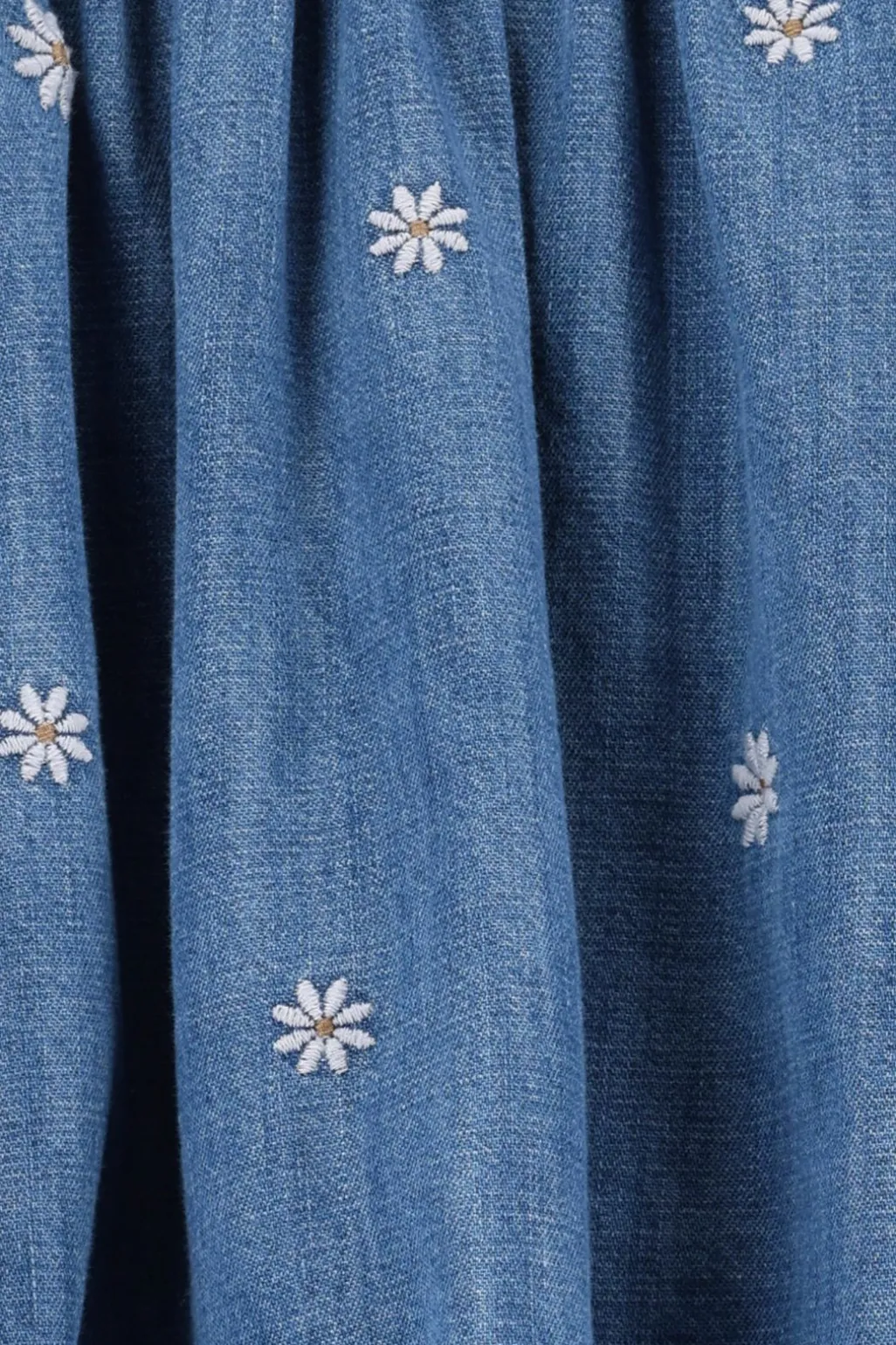 Blauwe rok met madeliefjes embroidery