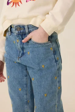 Blauwe tapered jeans met hartjes embroidery