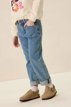 Blauwe tapered jeans met hartjes embroidery