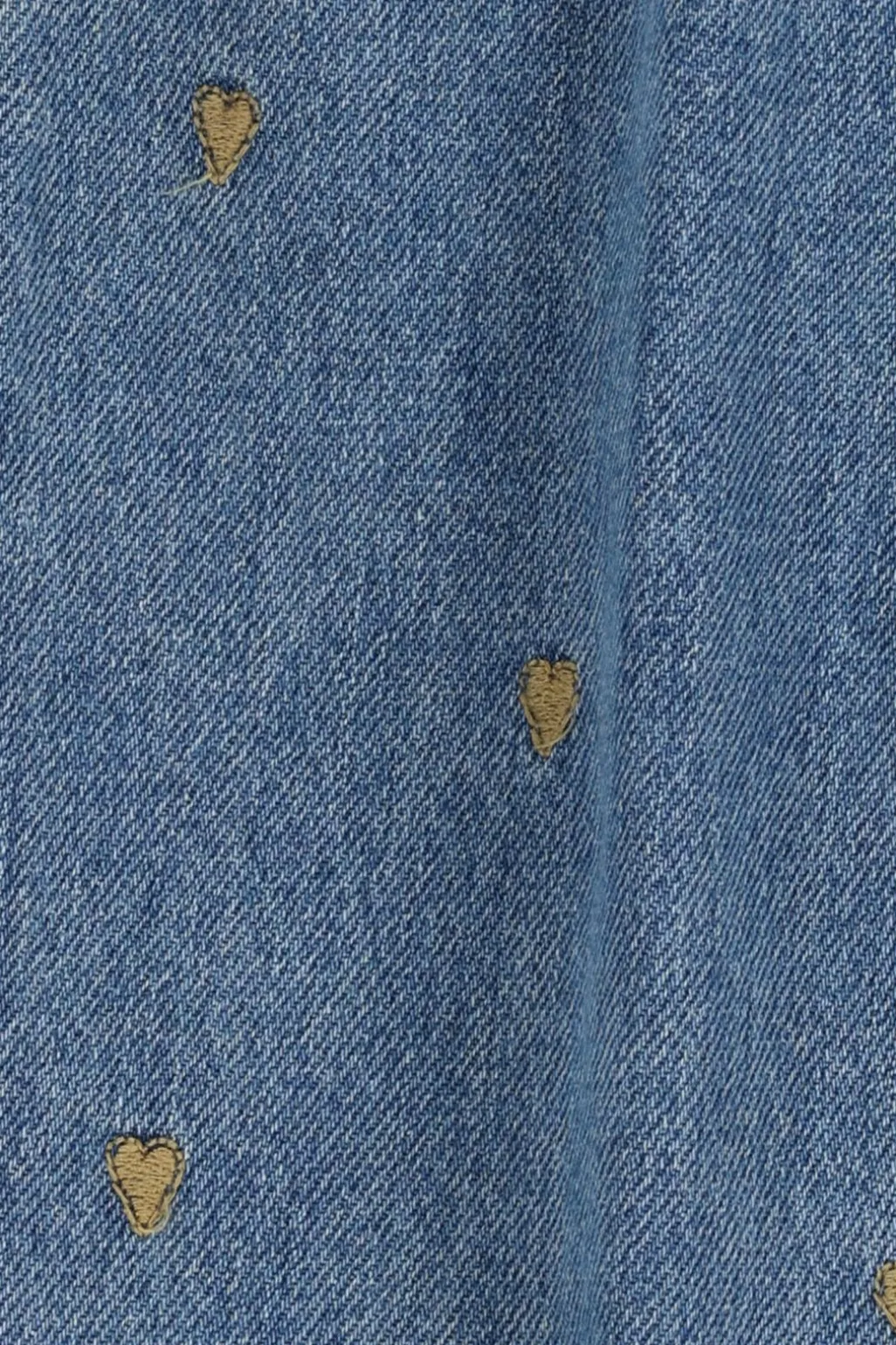 Blauwe tapered jeans met hartjes embroidery