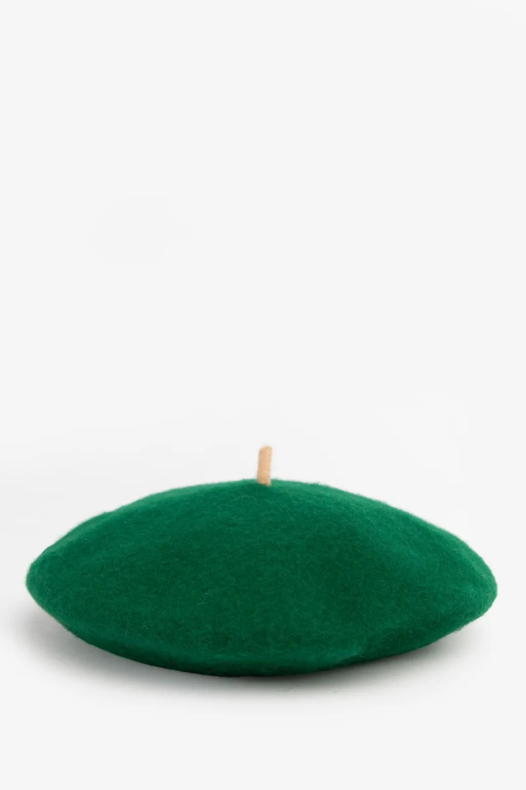 Donkergroene baret met contrasterende rand