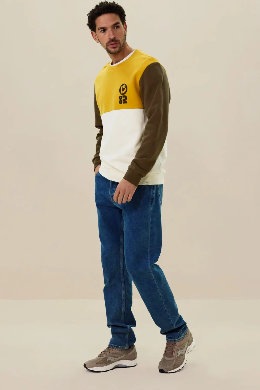 Donkergroene colourblock sweater met artwork