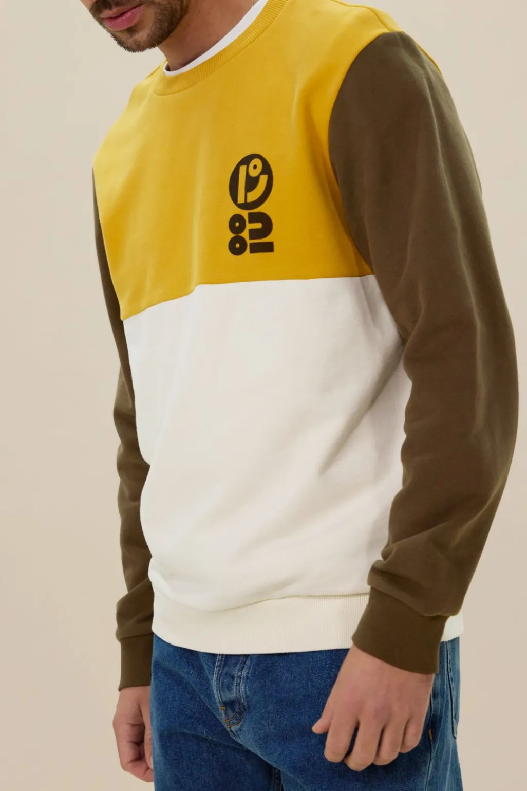 Donkergroene colourblock sweater met artwork