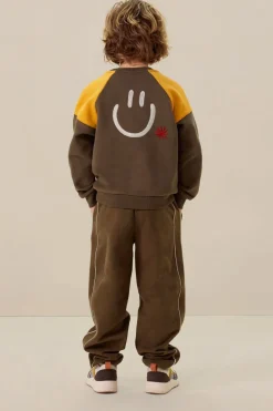 Donkergroene colourblock sweater met artwork