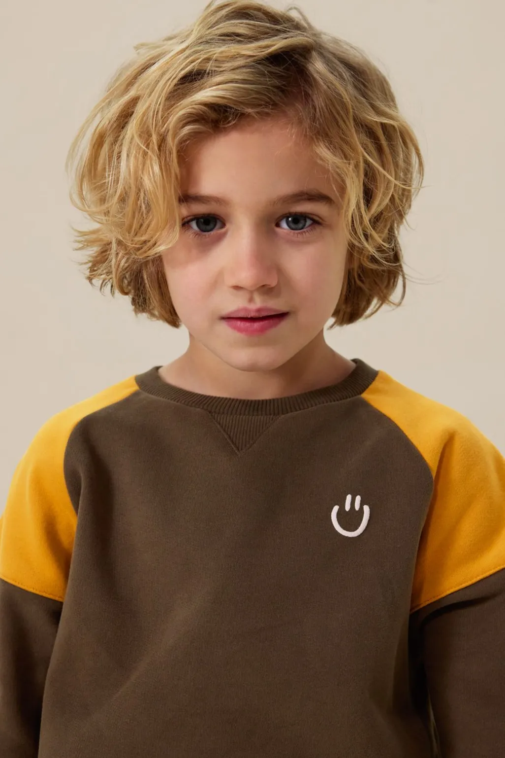 Donkergroene colourblock sweater met artwork