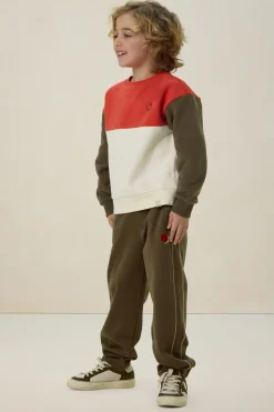 Donkergroene colourblock sweater
