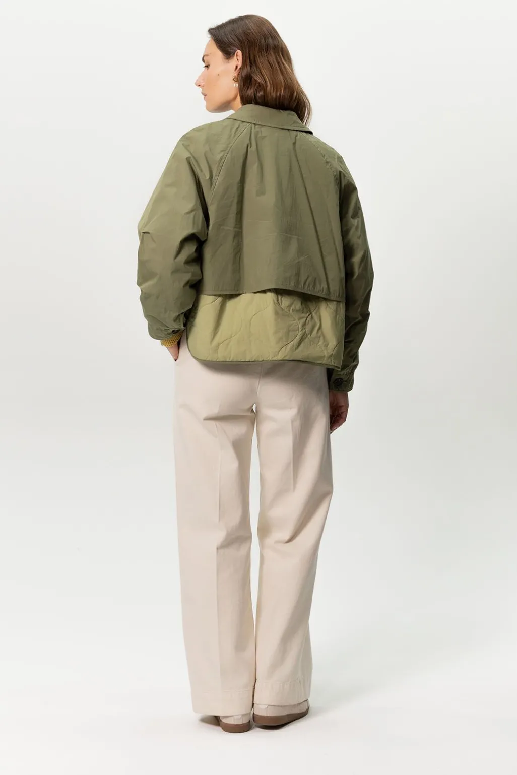 Donkergroene korte trenchcoat