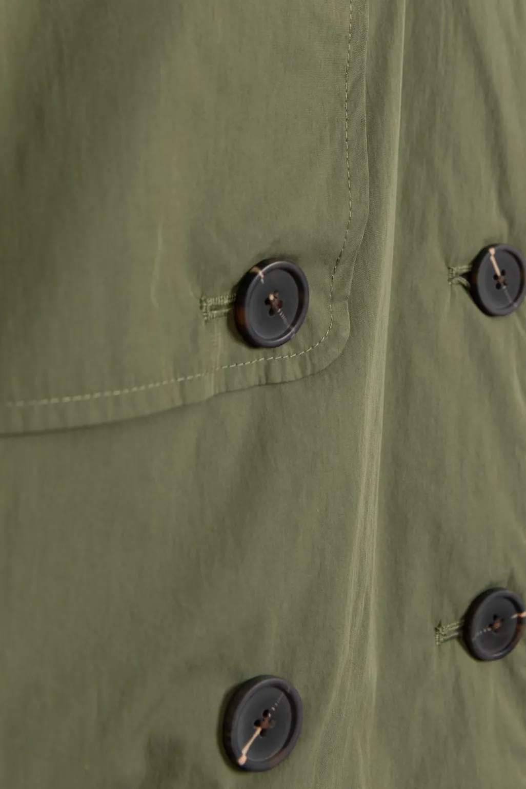 Donkergroene korte trenchcoat