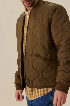 Donkergroene quilted jas