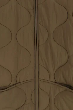 Donkergroene quilted jas