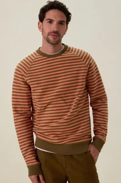 Donkergroene sweater met oranje strepen