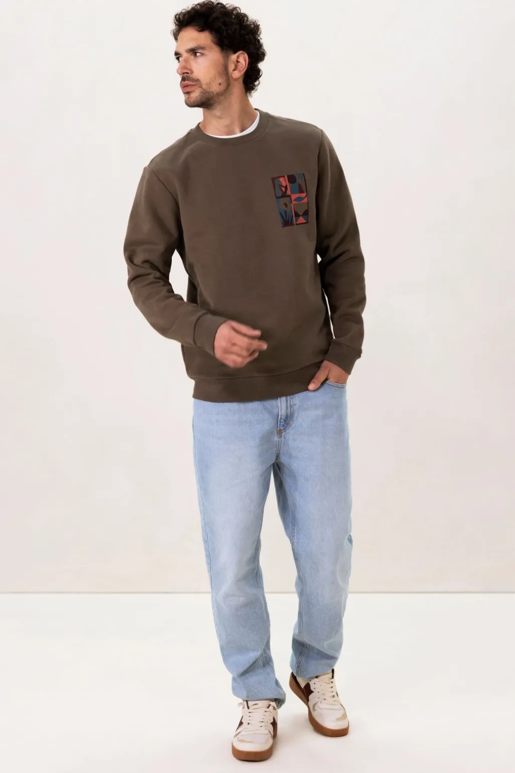 Donkergroene sweater met print