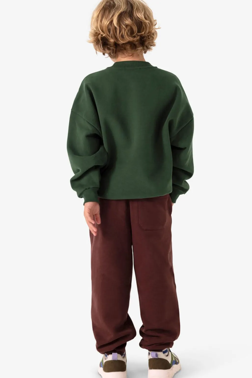 Donkergroene sweater met artwork