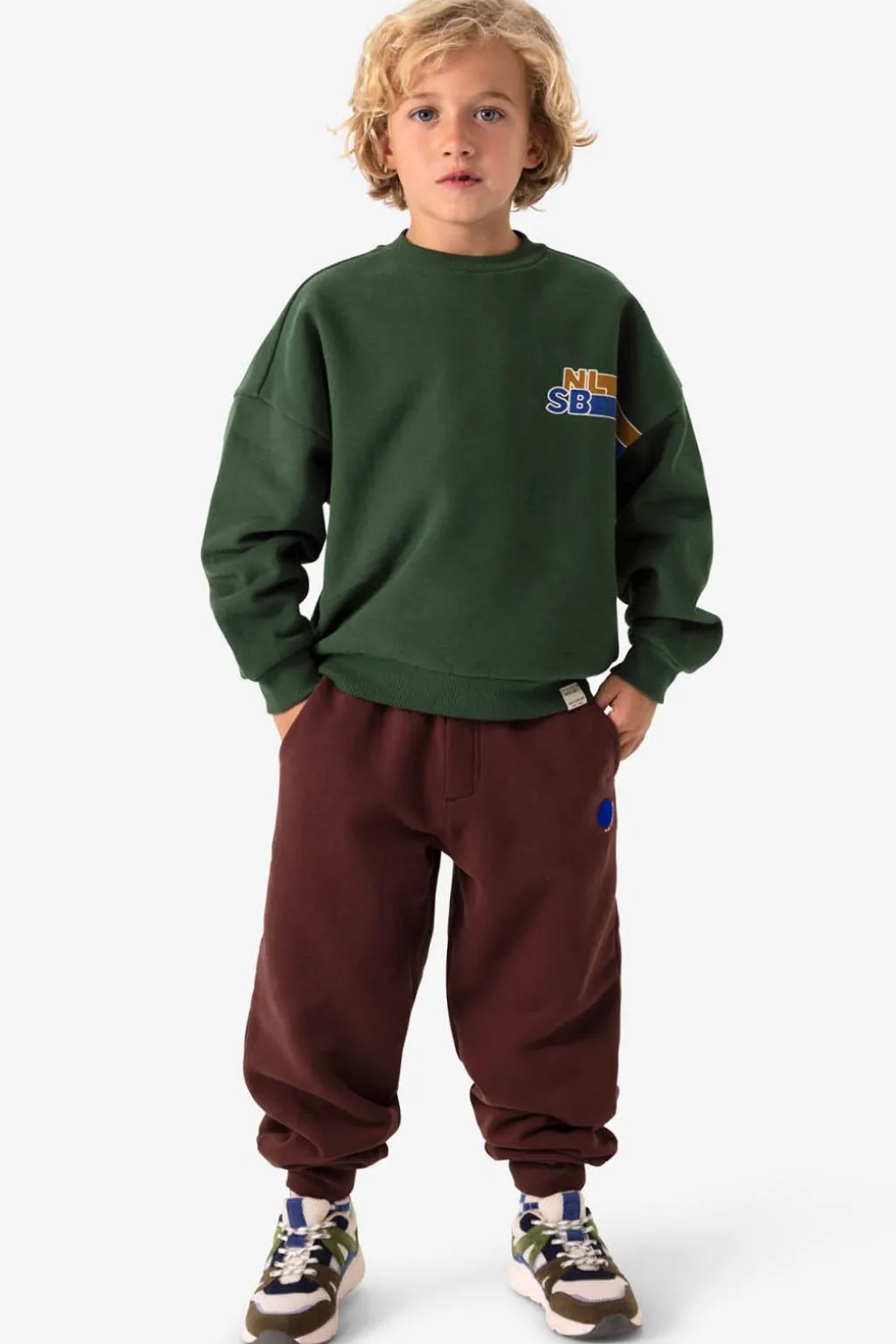 Donkergroene sweater met artwork