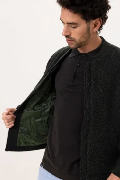 Donkergroene wollen jas met herringbone