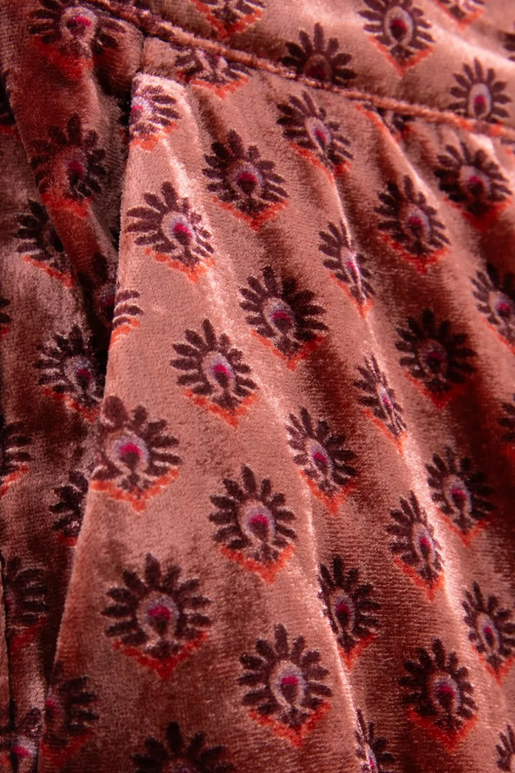 Donkerroze velvet broek met print