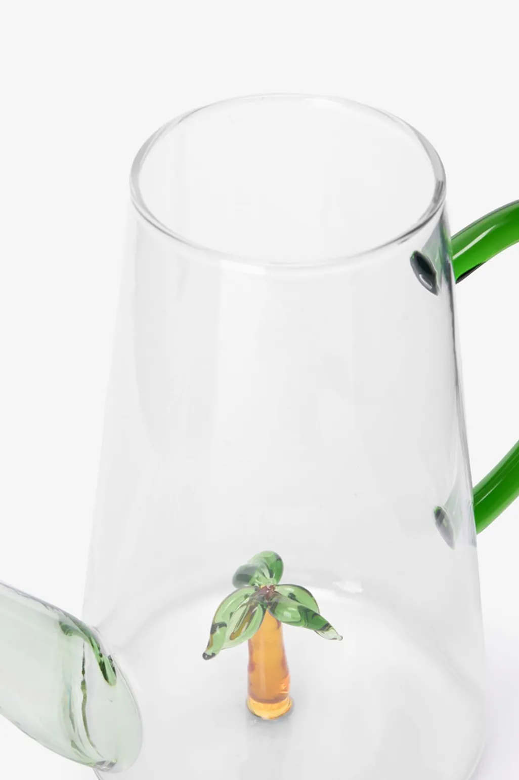 Glazen gieter met palmboom