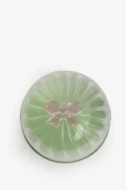 Glazen stolp met roze strikje