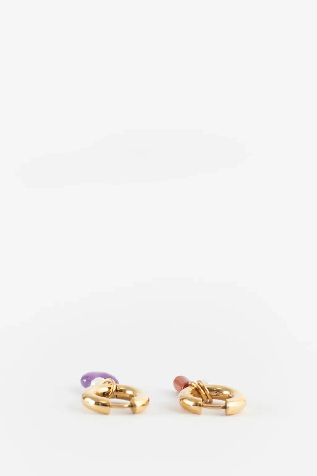 Gold plated oorbellen met verschillende hangertjes