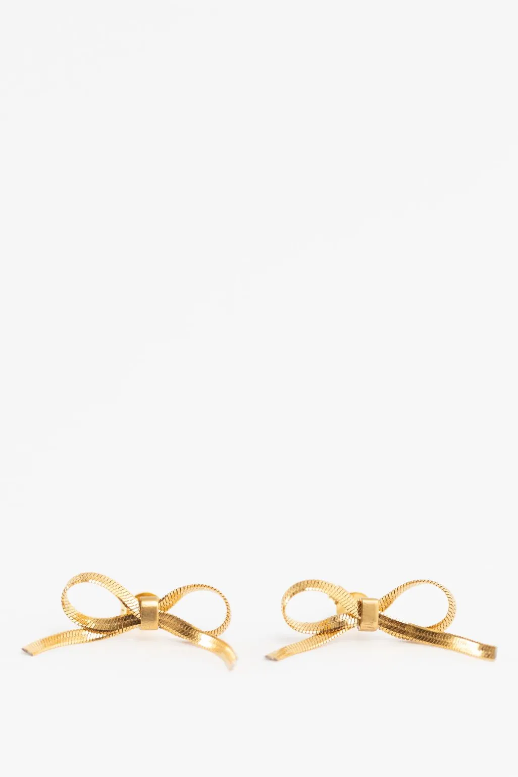 Gold plated stud oorbellen met strikjes