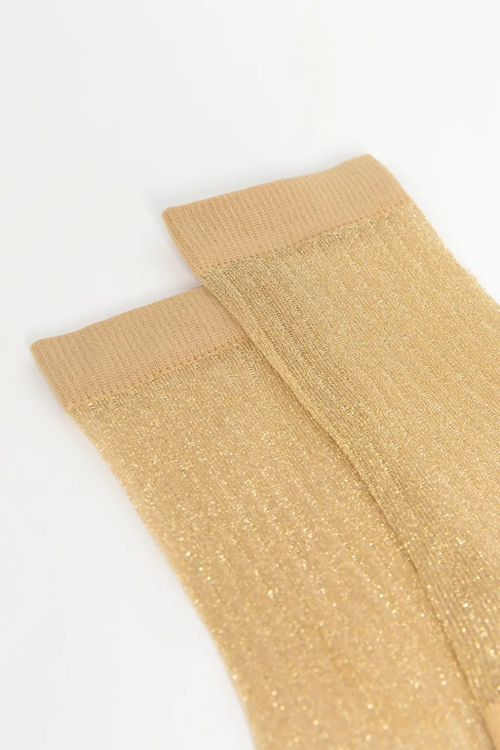 Gouden sheer glittersokken met rib