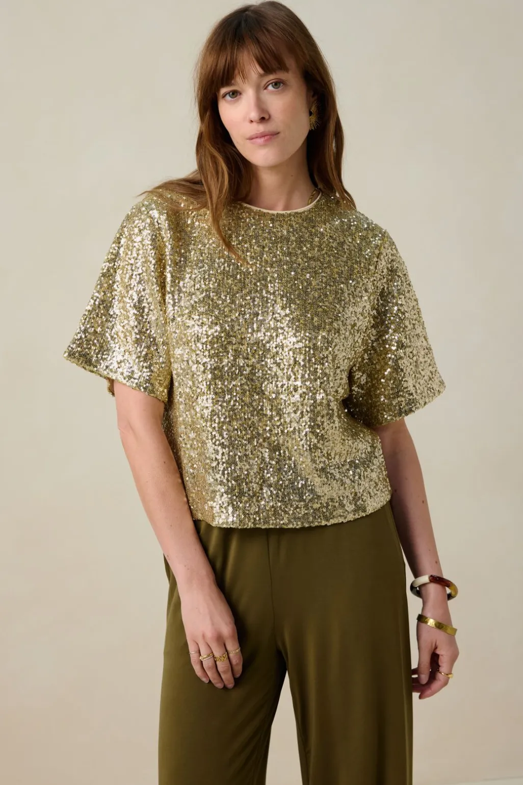 Gouden top met pailletten