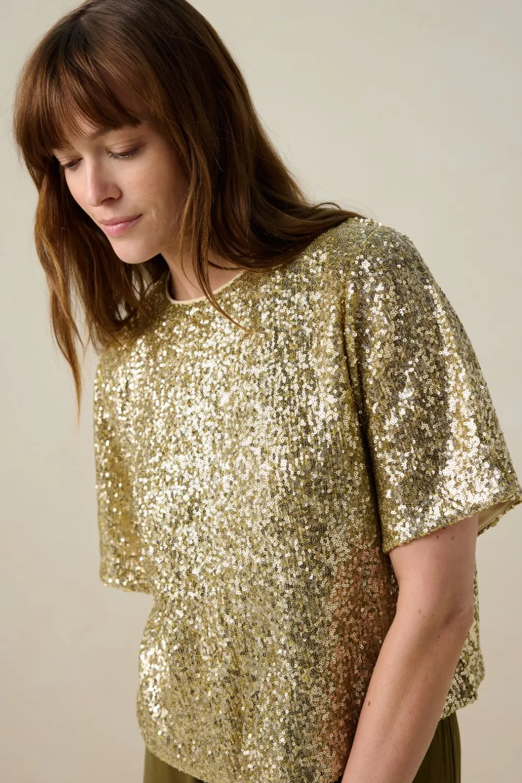 Gouden top met pailletten