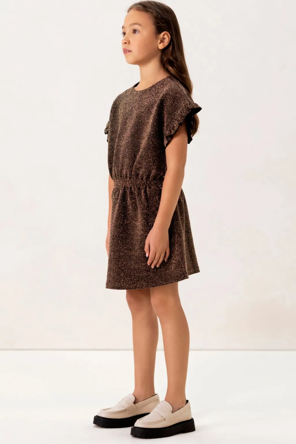 Goudkleurige jurk met glitters
