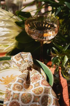 Goudkleurige servetringen met zonnetje