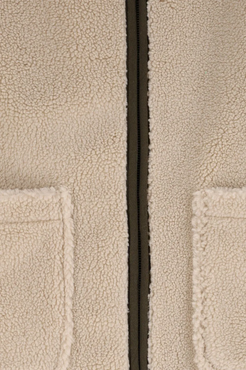 Groen geblokte reversible teddy bodywarmer