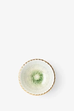 Groene deurknop met gouden details