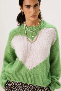 Groene gebreide trui met hart