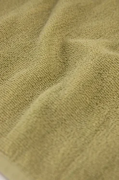 Groene handdoek en theedoek