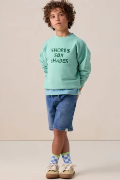 Groene sweater met artwork