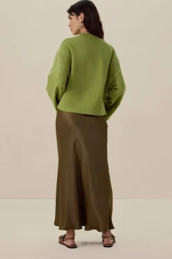 Groene sweater met wijde mouwen