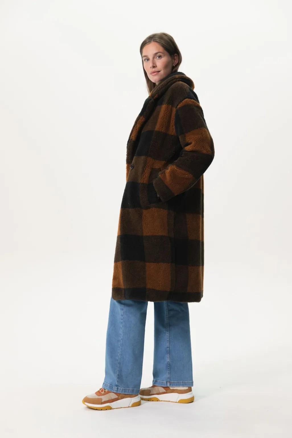 Lange geruite faux fur jas