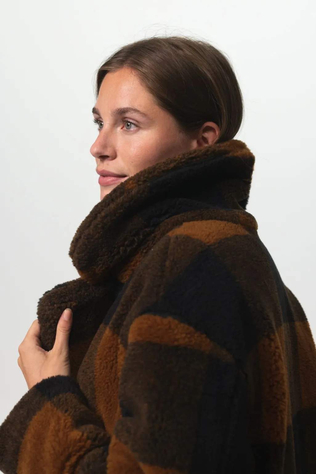 Lange geruite faux fur jas