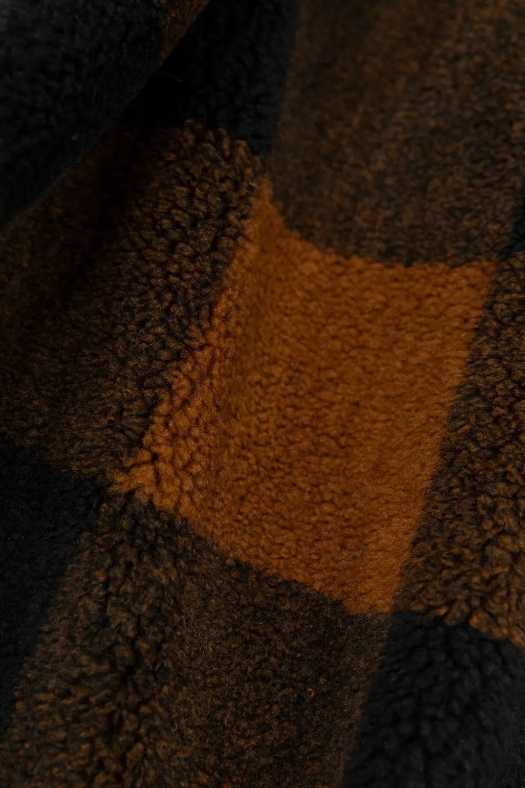 Lange geruite faux fur jas